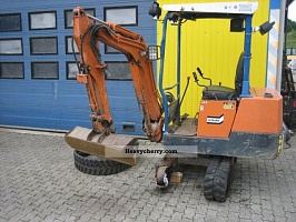   Takeuchi () ABS TB 12S Mini Tractor